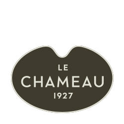 Dark green oval logo with Le Chameau 1927 for stylish Chameau rubber boots.