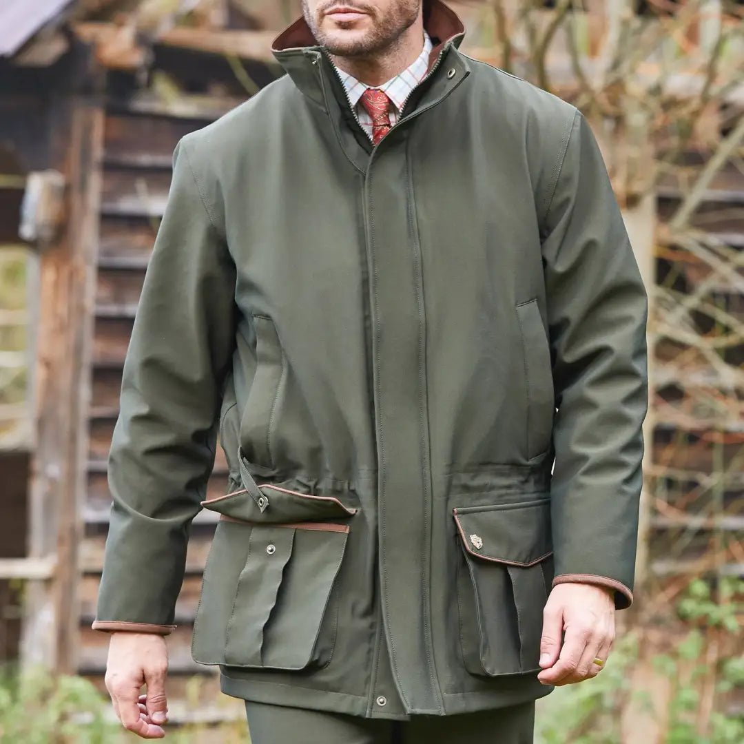 Green waxed cotton Alan Paine Stancombe waterproof coat with high collar and pockets