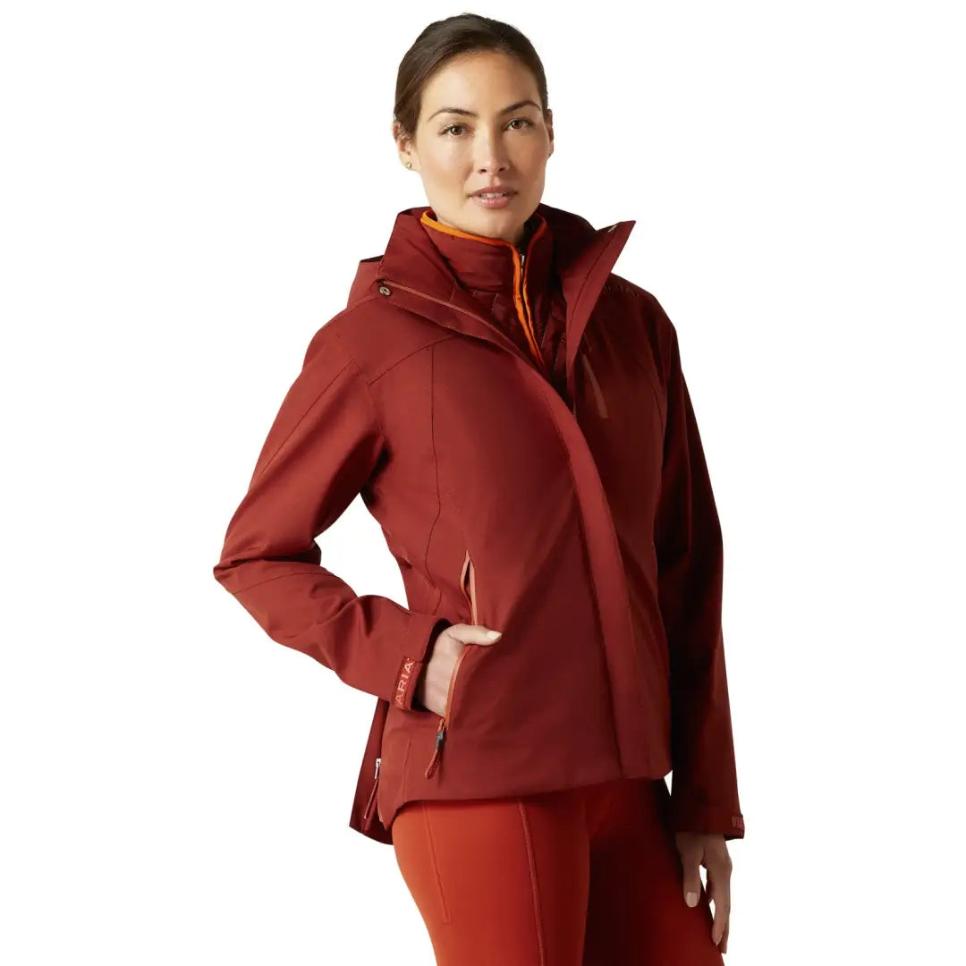 Red Ariat Coastal Waterproof Jacket with high collar, perfect for country clothing and outdoors