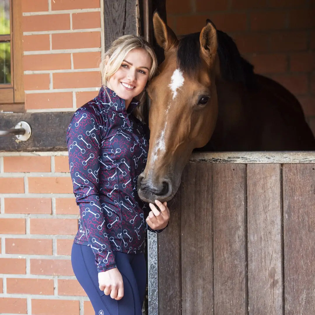 Brown horse with a blaze in a stable, perfect vibe for country clothing and outdoors