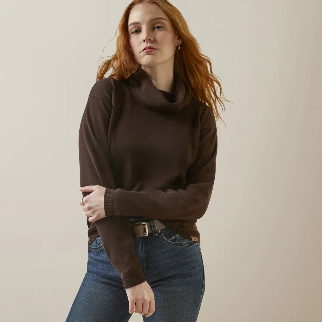 Woman in dark turtleneck and jeans, rocking the Ariat Womens Lexi Sweater for outdoors