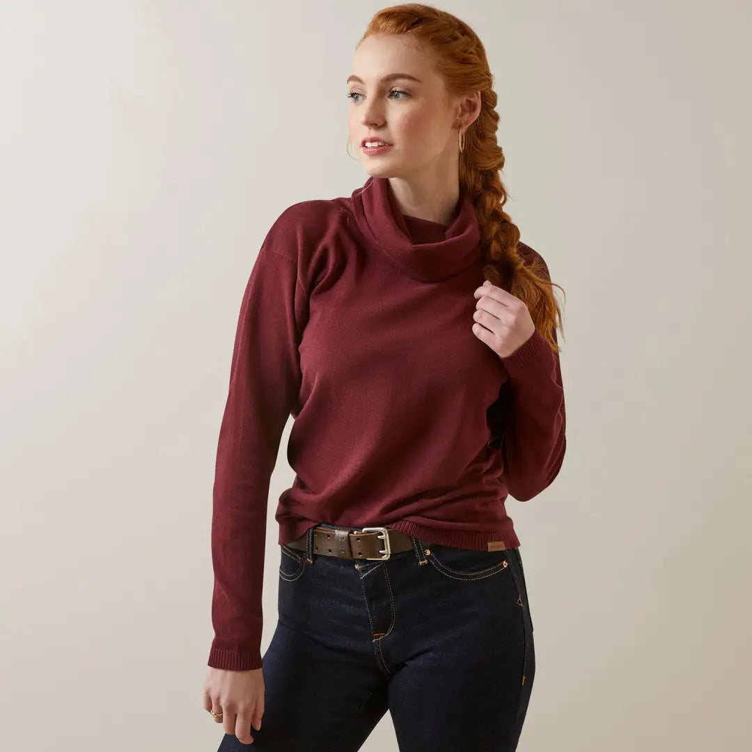 Woman with red hair in burgundy turtleneck, perfect for country clothing and outdoors