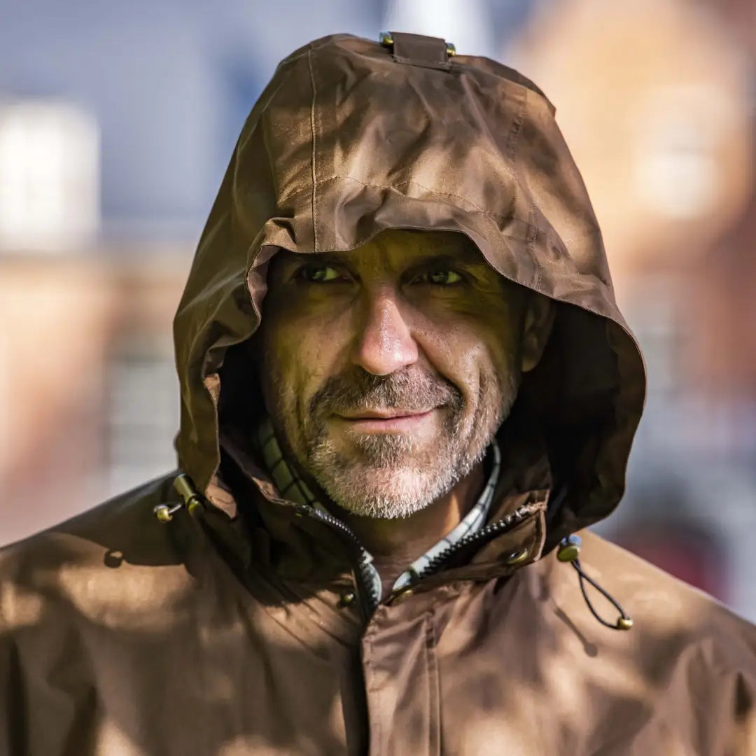 Man in a Baleno Newbury Mens Full Length Coat sporting a slight smile