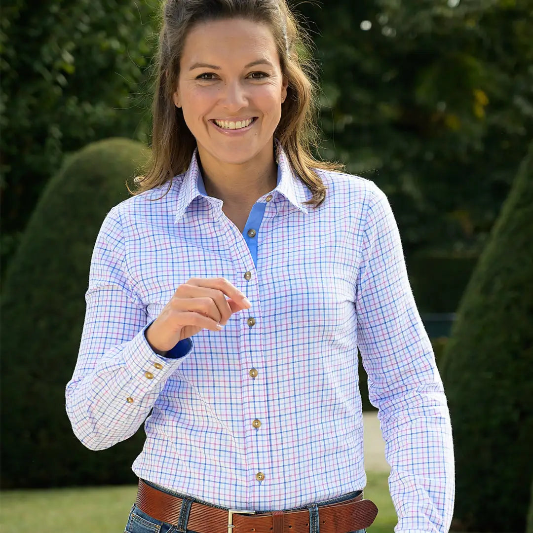 Woman in a Baleno Nina check shirt with a stylish blue and white pattern