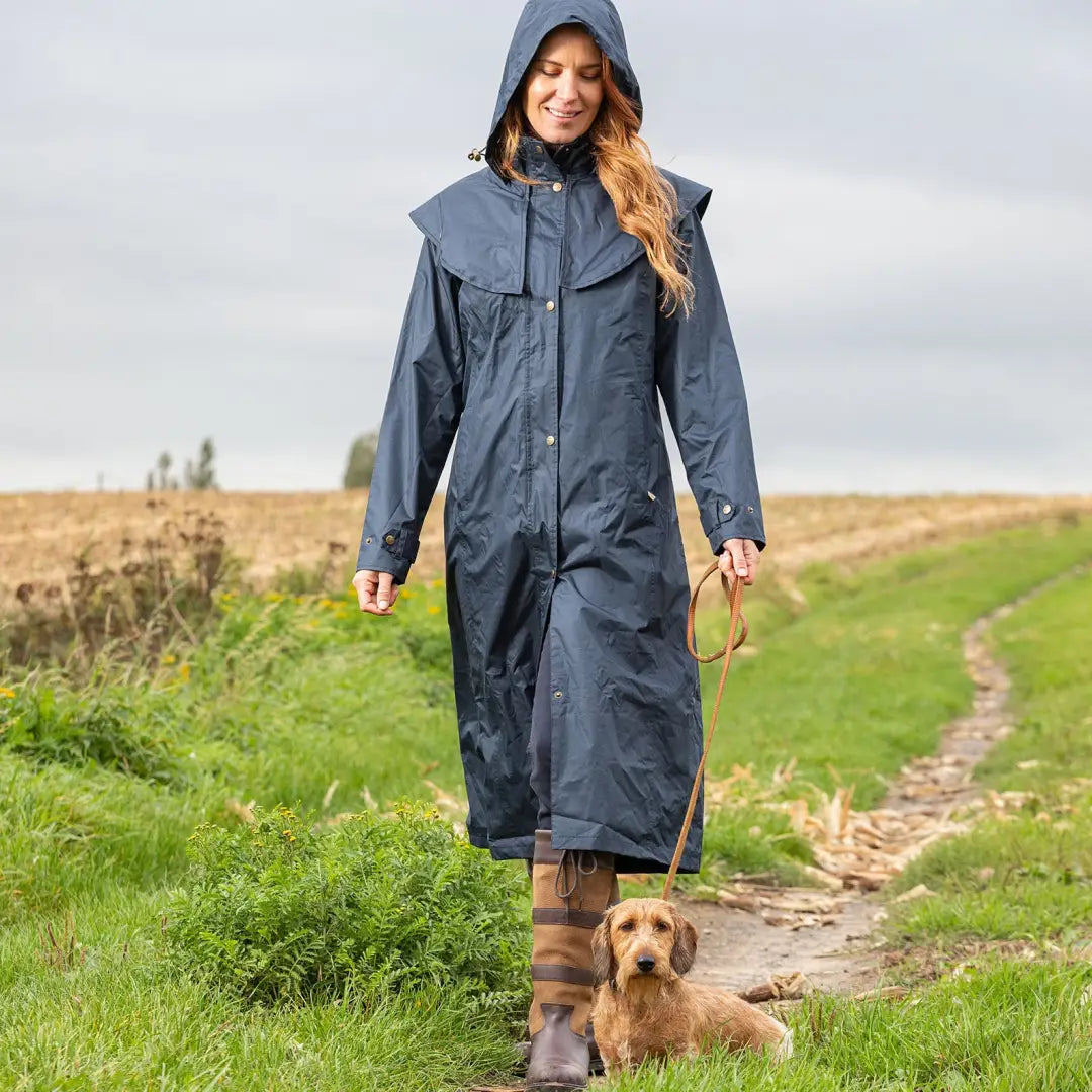 Long navy blue Baleno Oxford women’s coat with hood, perfect for walking a dog