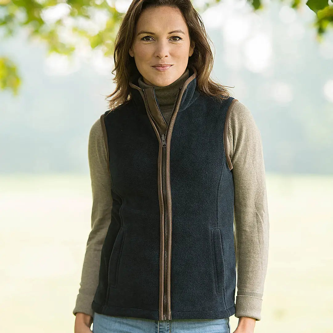 Dark fleece vest with zipper over turtleneck featuring Baleno Sally Ladies fleece design