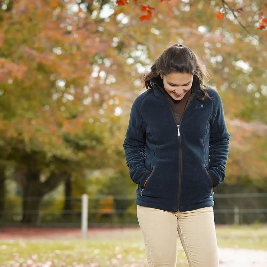 Person in a Baleno Southwell Ladies Waterproof Fleece enjoying autumn outdoors