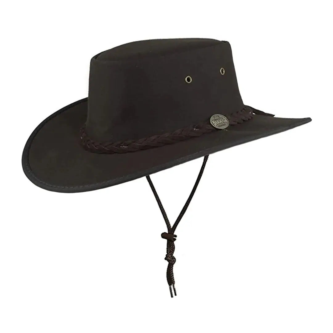 Black leather outback hat with chin strap and emblem, perfect for oilskin canvas lovers