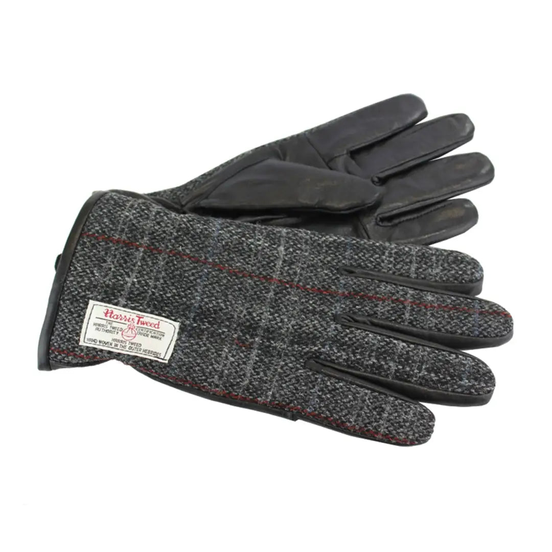 Pair of dark Harris Tweed gloves made from pure virgin wool with leather detailing