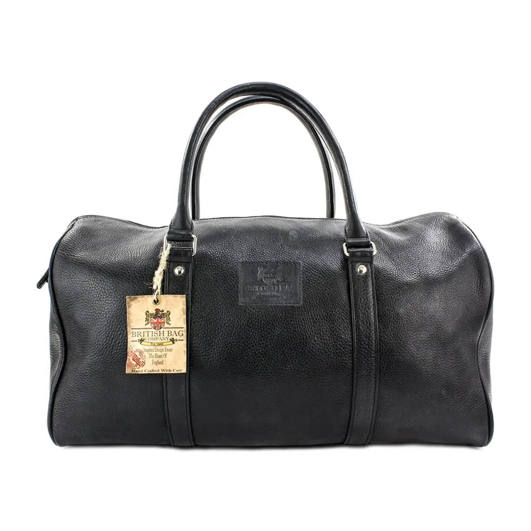 Stylish Black Pebble Grain Leather Holdall with handles and a tag, perfect for country clothing