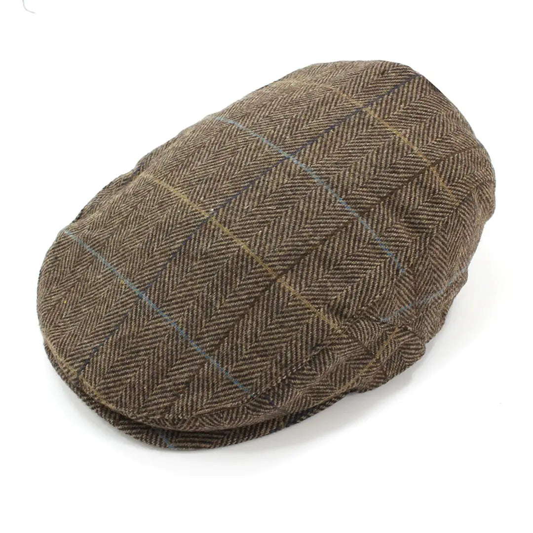 Flat cap in brown herringbone check, perfect for country clothing and hunting vibes