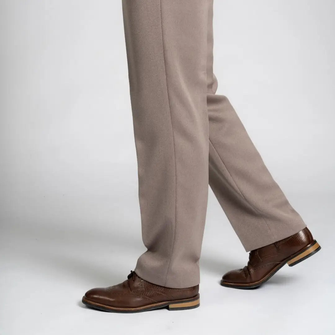 Brown leather dress shoes complement Cavalry Twill Trousers with beige trousers