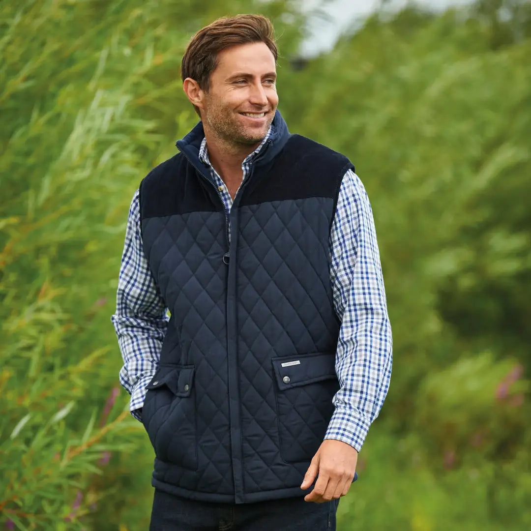 Quilted navy and black Champion Arundel Bodywarmer over a checkered shirt