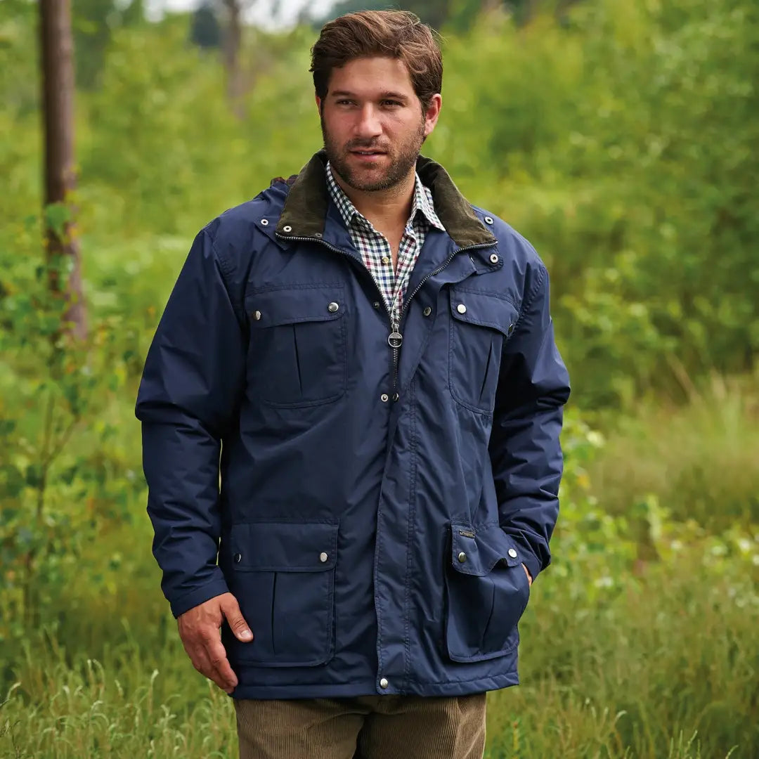 Navy blue Champion Balmoral Jacket with pockets and collared neckline for outdoor fun