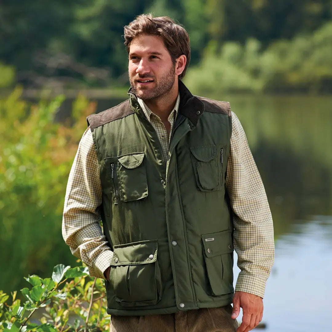 Olive green Champion Exmoor Bodywarmer over a beige checkered shirt for outdoor style