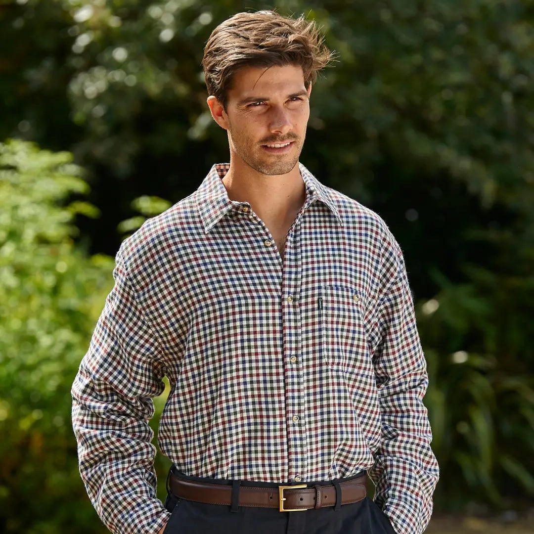 Man wearing a Champion Heathfield fleece lined shirt with a stylish checkered pattern