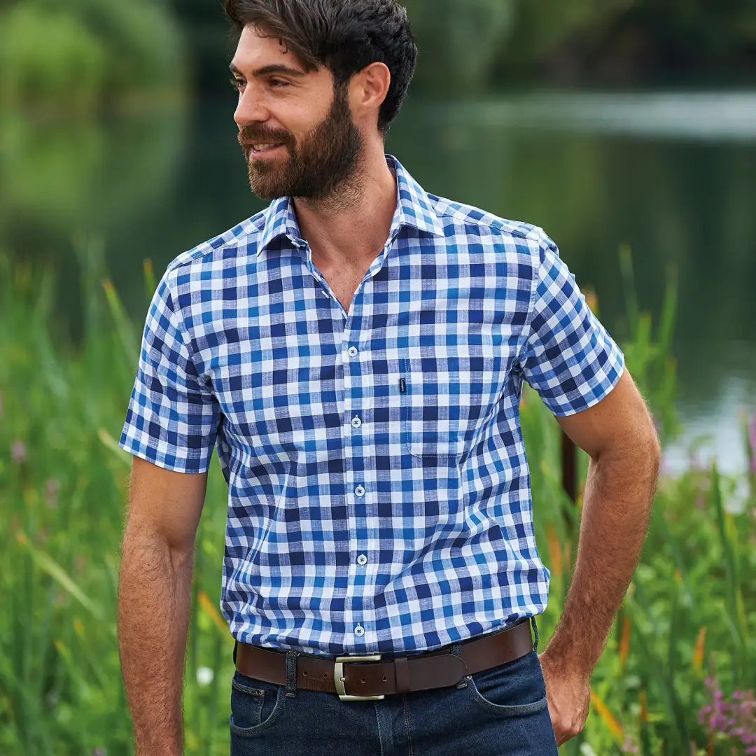 Blue and white checkered Champion Holkham Short Sleeve Shirt perfect for casual wear