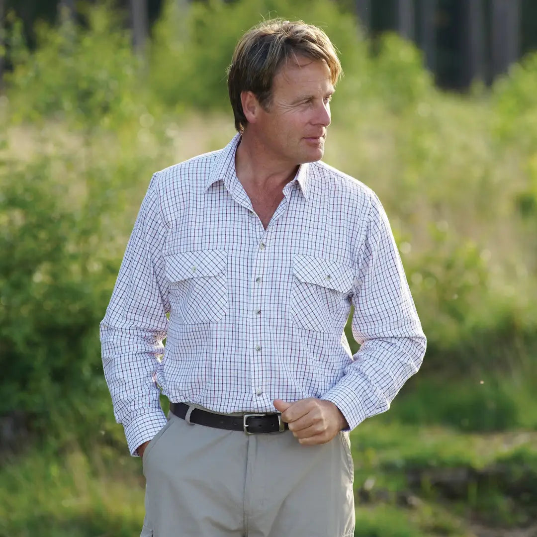 Man in a Champion Tattersall Shirt with a white and blue checkered pattern