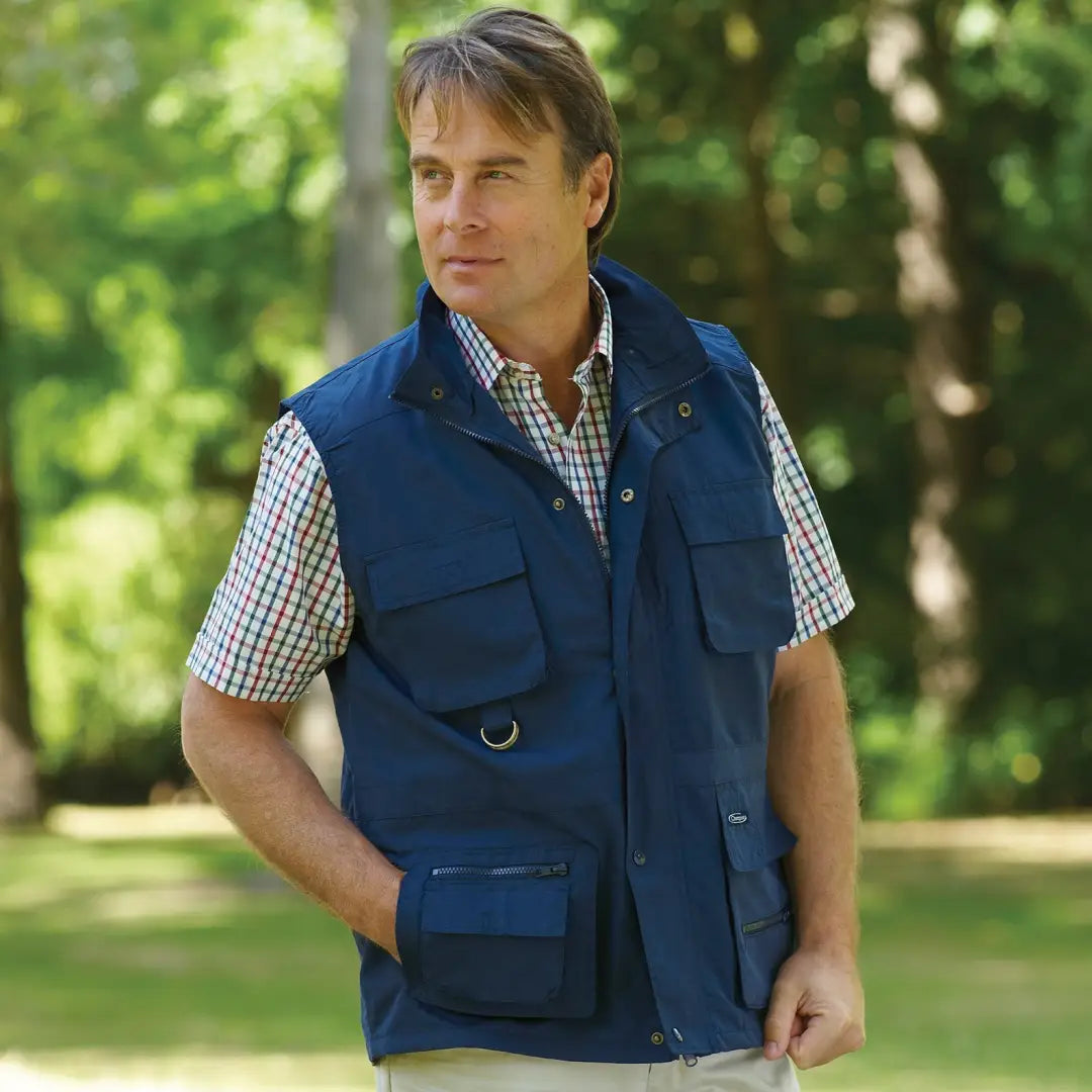 Navy blue Champion Windermere Gilet over a checkered short-sleeve shirt