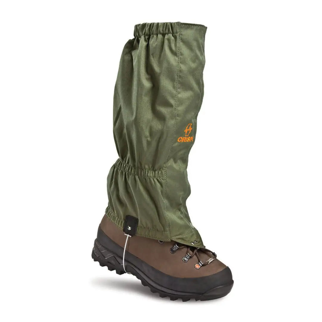 Olive green waterproof hiking gaiter over a brown boot for country clothing and outdoors