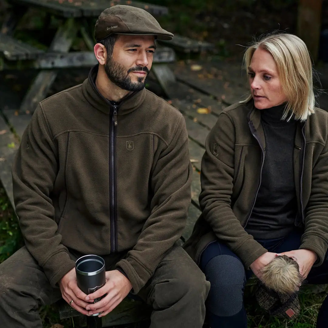 Two friends enjoying the outdoors in their cozy Eagle Fleece Jacket this autumn