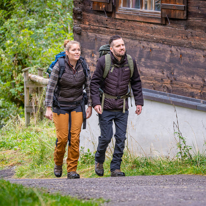 Hiking couple wearing Lady Caroline Padded Waistcoat, ready for outdoor adventures