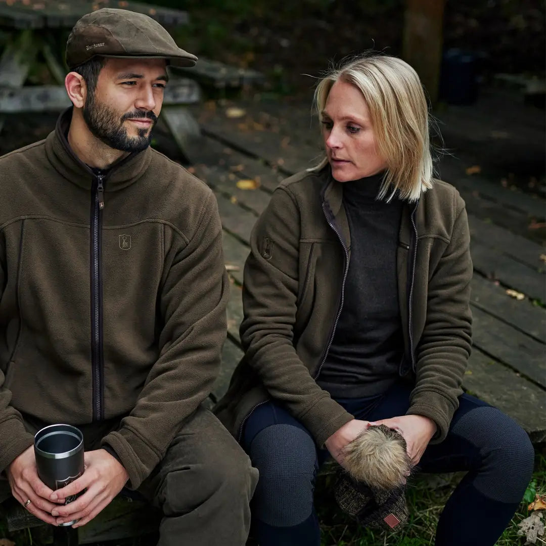 A man and woman in casual autumn wear showcasing the Lady Eagle Fleece Jacket outdoors