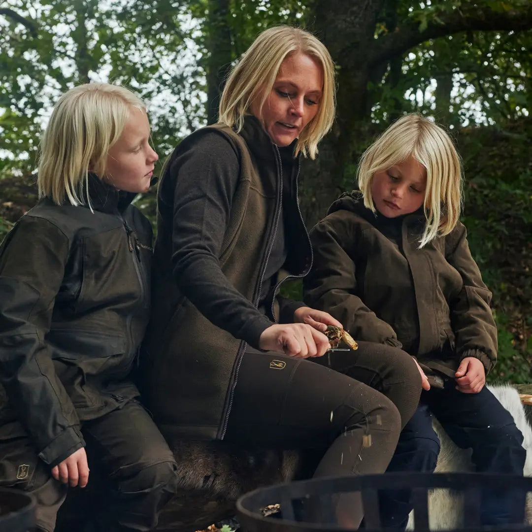 Three blondes in dark outfits enjoying the outdoors in a Lady Eagle Fleece Waistcoat