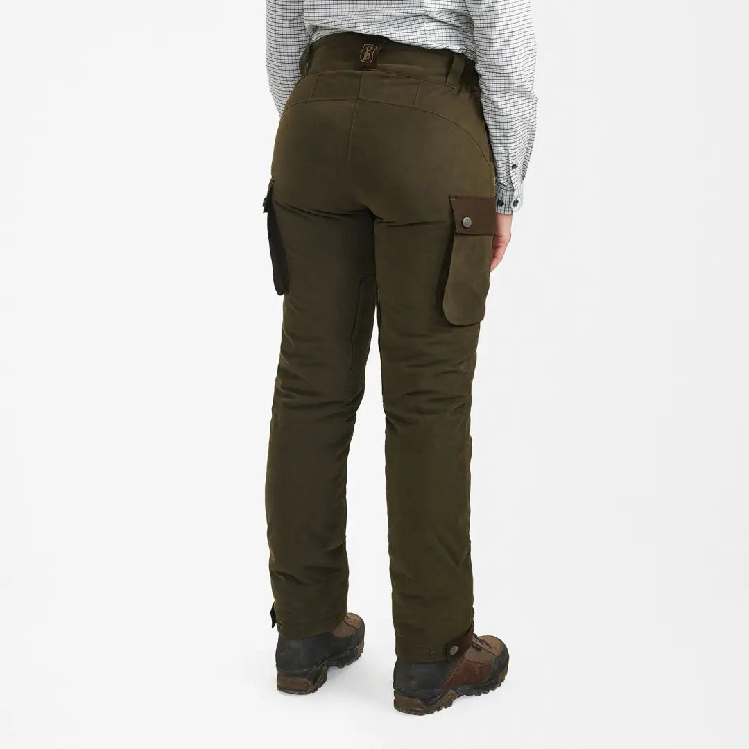 Olive green cargo pants with pockets worn by a person in Deerhunter Lady Eagle Winter Trousers