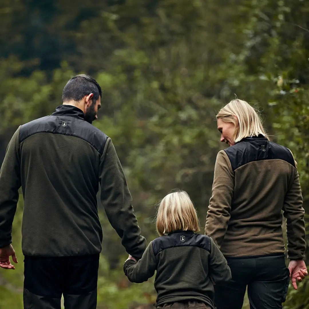 Family enjoying nature, showcasing the stylish Deerhunter Lady Northward Fleece Jacket