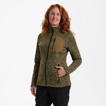 Woman with curly red hair models the Deerhunter Lady Sarek knitted jacket in green