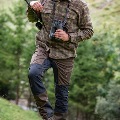 Hunter in plaid shirt rocking Deerhunter Rogaland Contrast Stretch Trousers for style and comfort