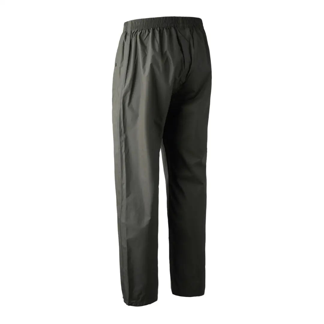 Dark green Deerhunter Survivor Rain Trousers with elastic waistband for wet weather