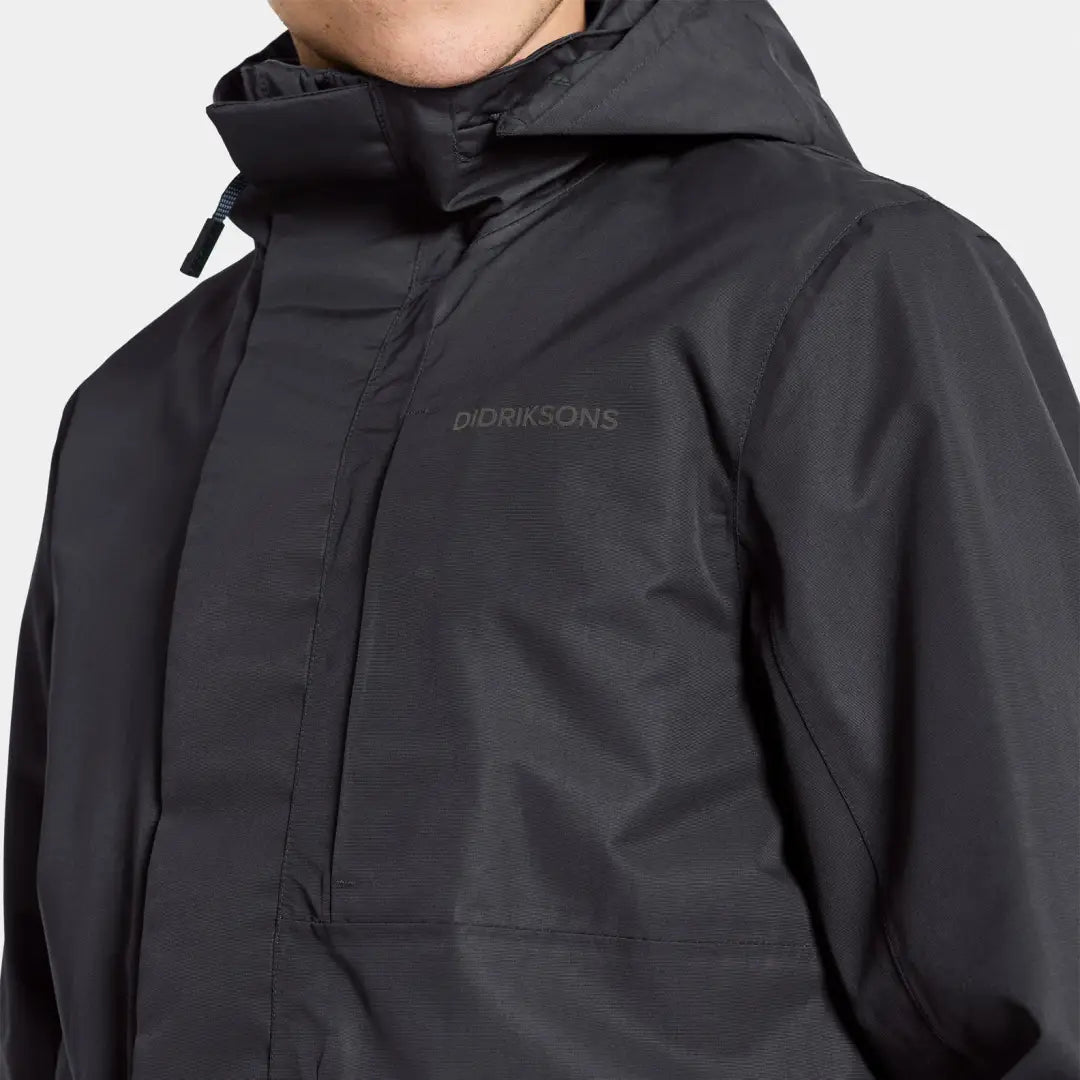 Black hooded Didriksons Andreas Parka with zipper and snap closure for winter style