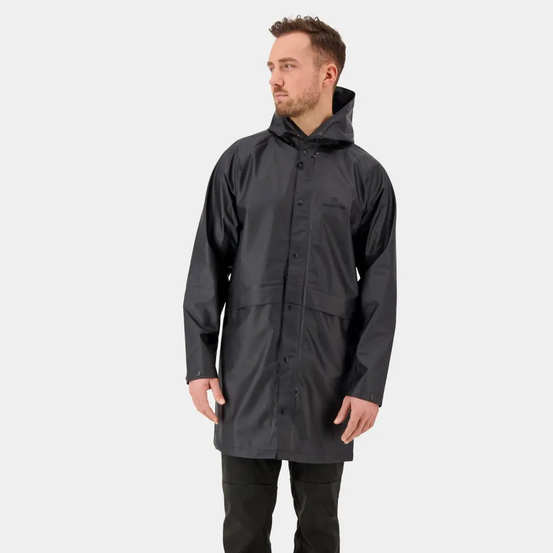 Dark gray Didriksons Avon Parka worn by a man, featuring a windproof design and storm flap