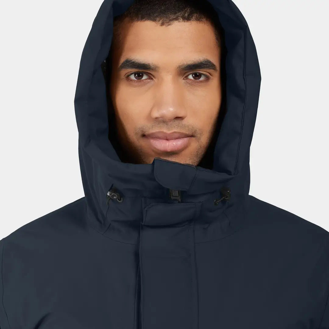 Person in a dark hooded jacket showcasing Didriksons Drew Parka offers