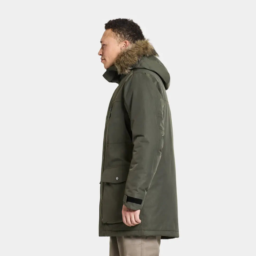 Green winter parka with fur-trimmed hood for stylish country clothing and outdoors activities