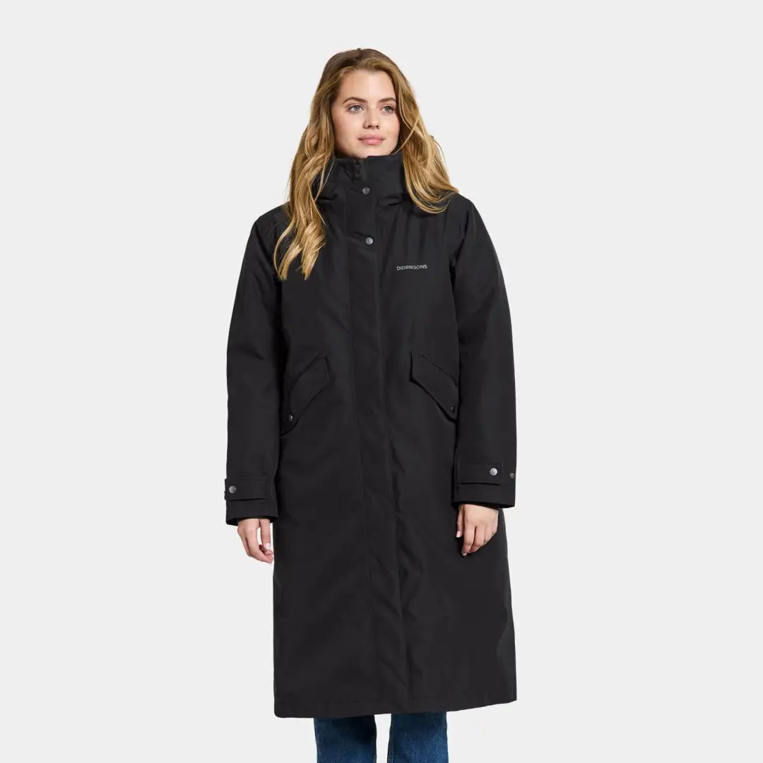 Long black winter coat with high collar and pockets, perfect long everyday parka