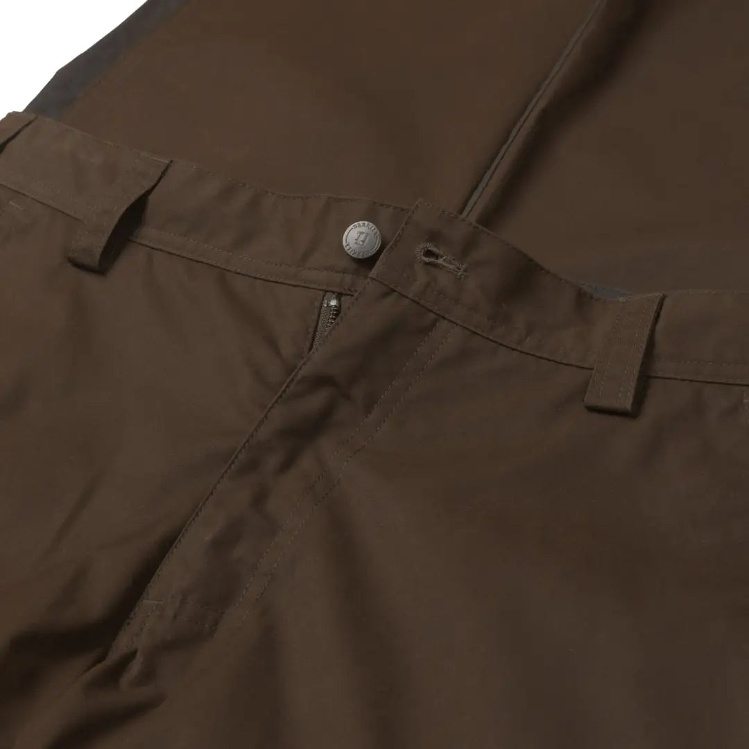 Brown Harkila Asmund Trousers with button closure in durable waxed canvas fabric