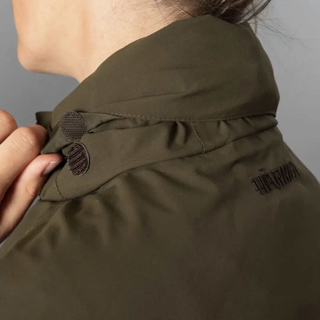 Olive green collar with button details on Harkila Ladies Orton Tech HWS Jacket