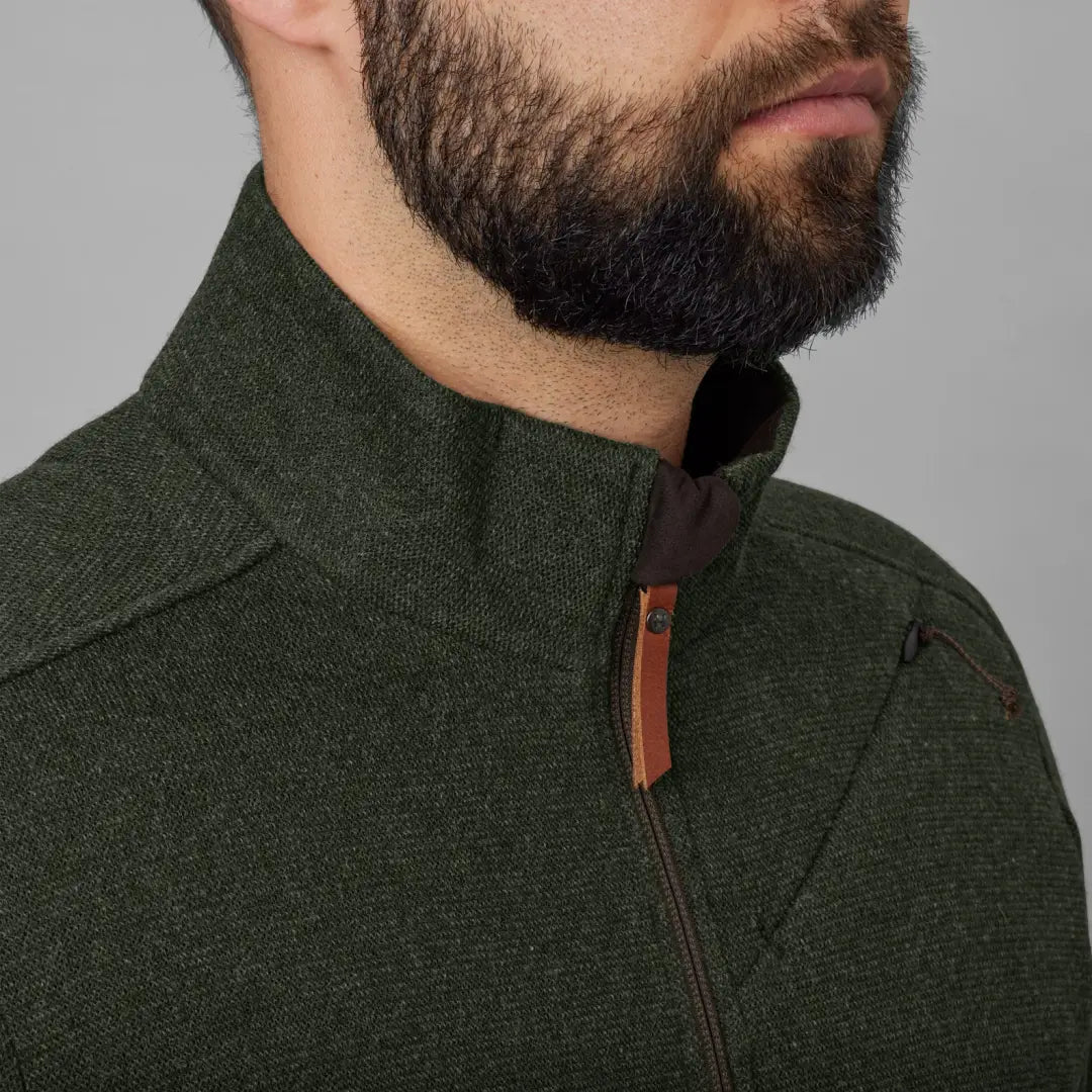 Dark green zip sweater with high collar and leather pull, perfect warm garment made for chilly days