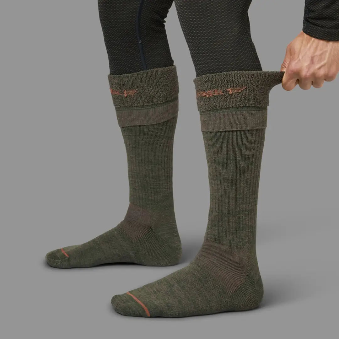 Olive green Harkila Pro Hunter 2.0 long socks with stylish folded cuffs