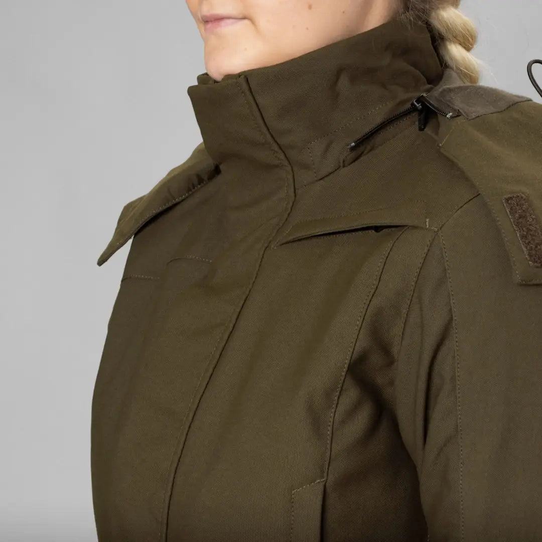 Olive green Harkila Pro Hunter GTX Ladies Jacket with high collar and zipper closure