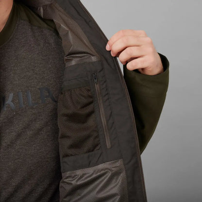 Dark-colored Harkila Pro Hunter Move 2.0 GTX Jacket with zippered chest pocket