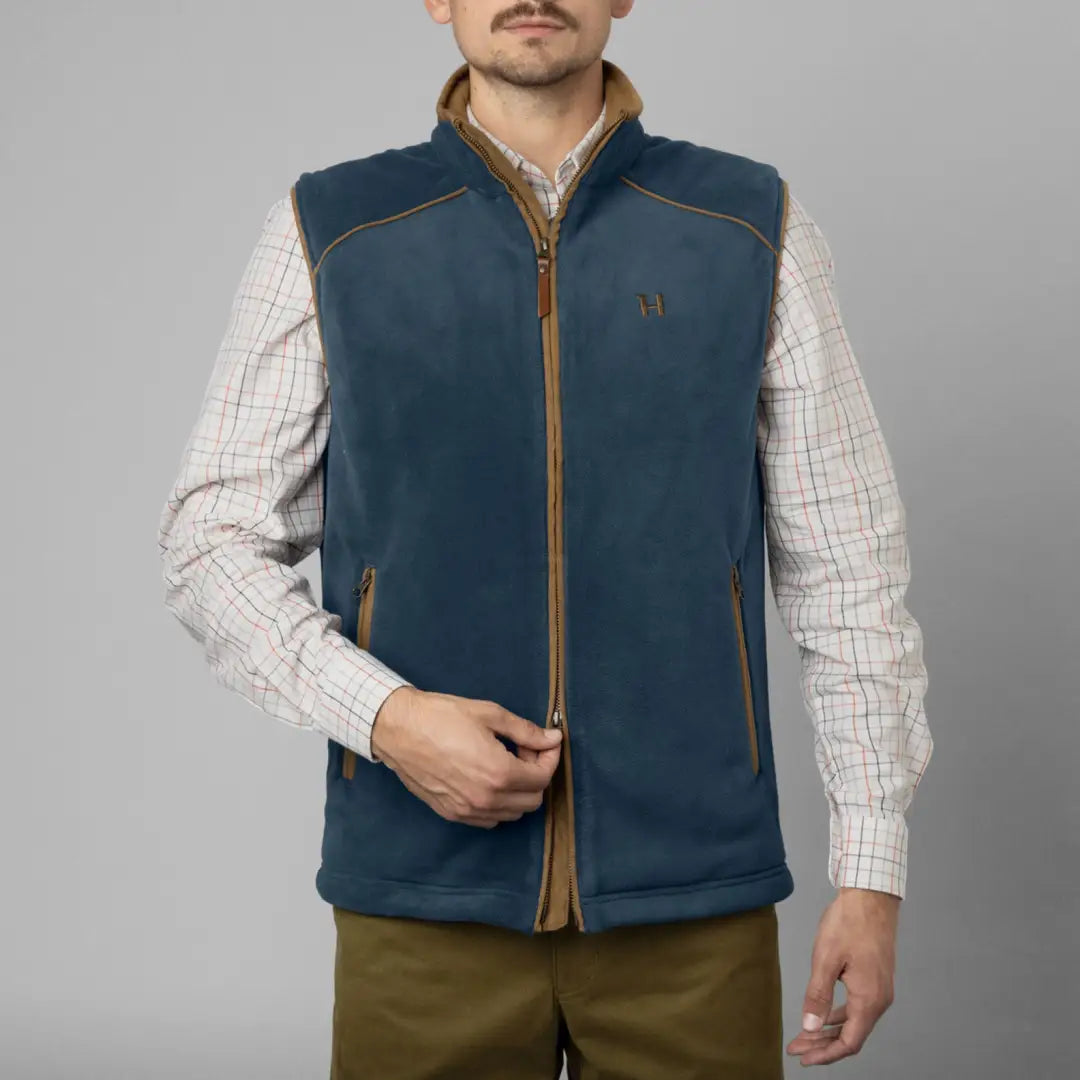 Blue fleece Harkila Sandhem vest with brown trim, perfect for country clothing and hunting