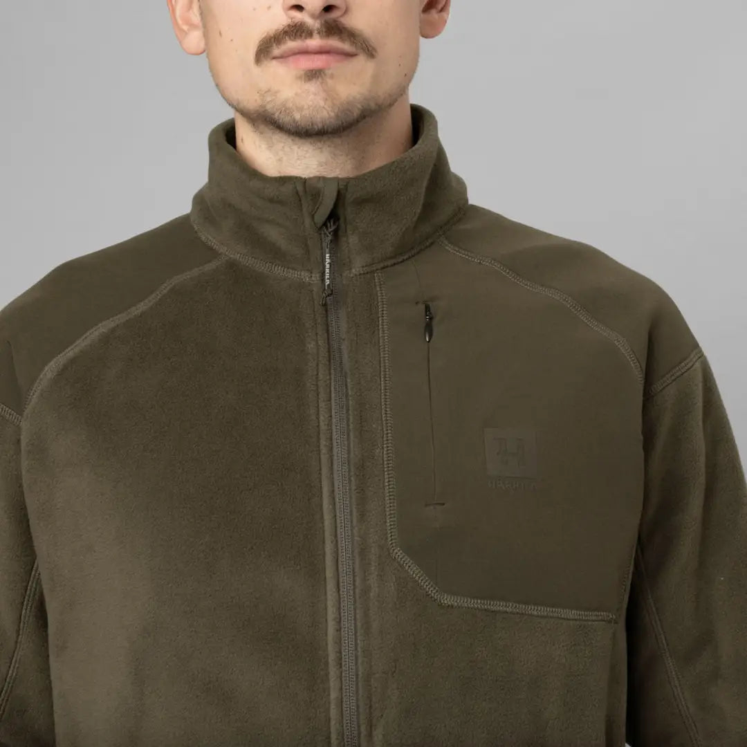 Olive green Harkila Venjan fleece jacket with high collar and chest pocket