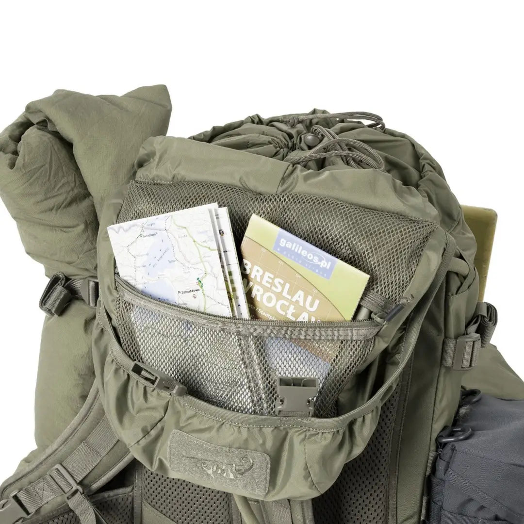 Military-style Helikon-Tex Matilda Backpack with map and guidebook in matilda® pocket