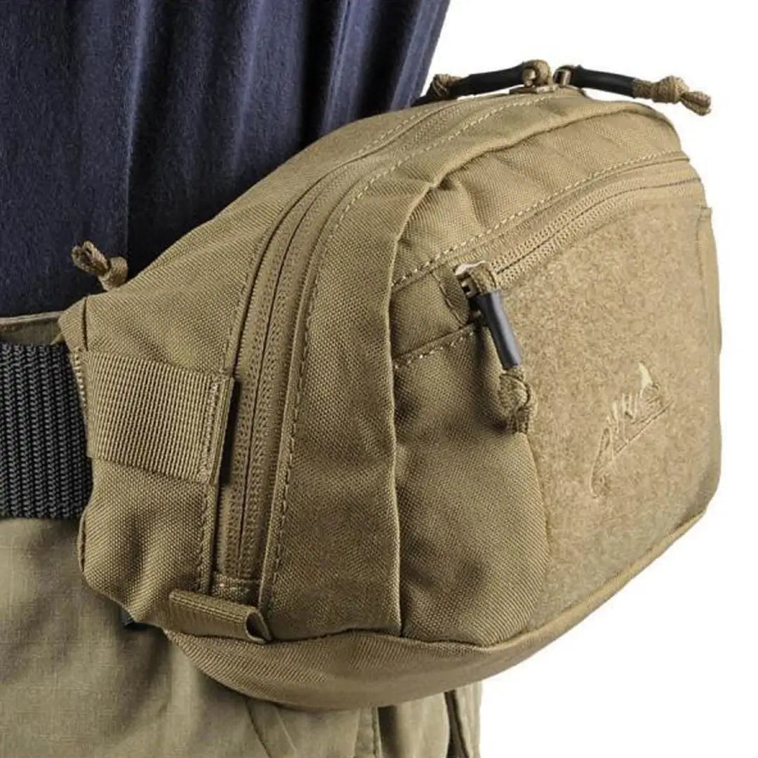 Tan tactical waist bag with zippered compartments perfect for country clothing and outdoors