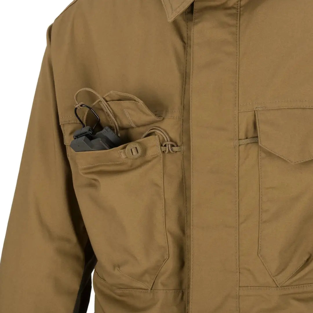 Tan Helikon-Tex Woodsman Shirt with pockets, perfect for outdoor enthusiasts and bushcraft