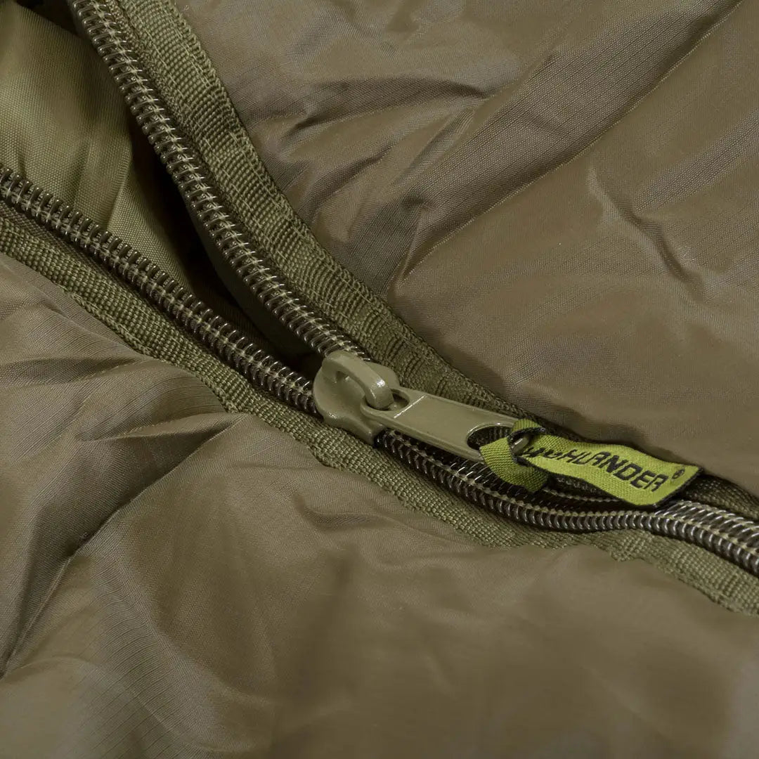 Zipper on khaki fabric with green Anaconda tag for Highlander Challenger 400 Sleeping Bag